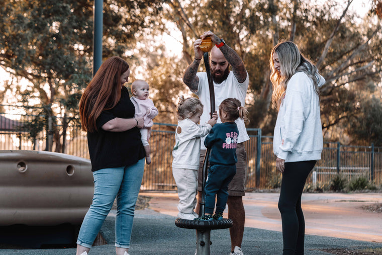 Family with children at a playground