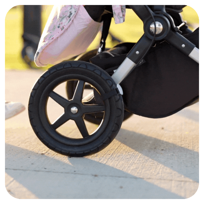 Lullabump on pram wheel soothing baby to sleep